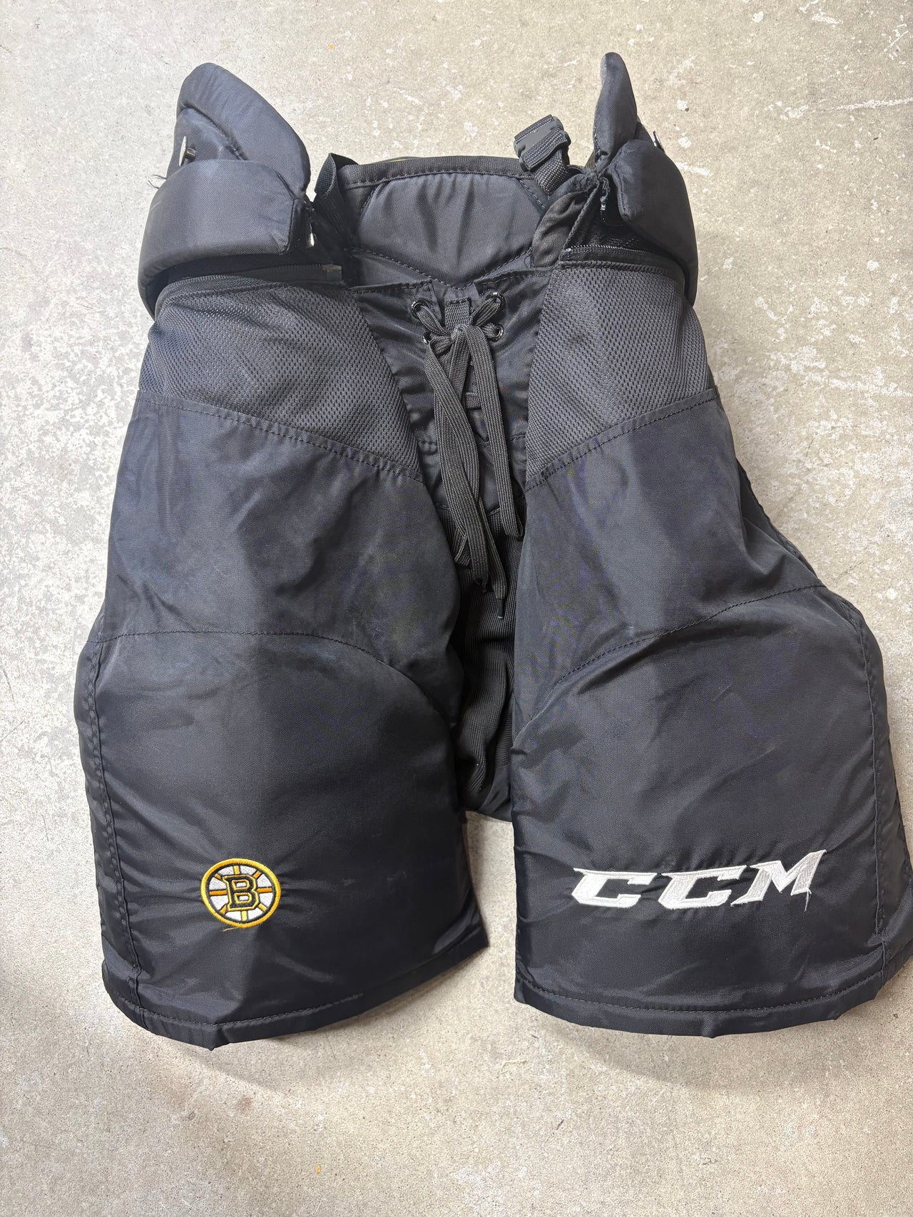 Large Boston Bruins CCM HPTK Hockey Pants Pro Stock (Used)